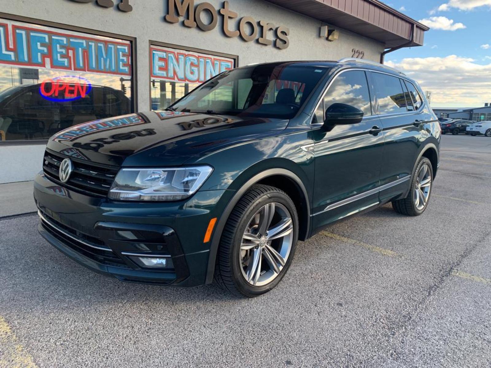 2019 Dark Moss Green Metallic /Titan Black Volkswagen Tiguan SEL R-Line (3VV2B7AX5KM) with an L4, 2.0L engine, 8-speed automatic transmission, located at 222 N Cambell St., Rapid City, SD, 57701, (866) 420-2727, 44.081833, -103.191032 - Photo #1