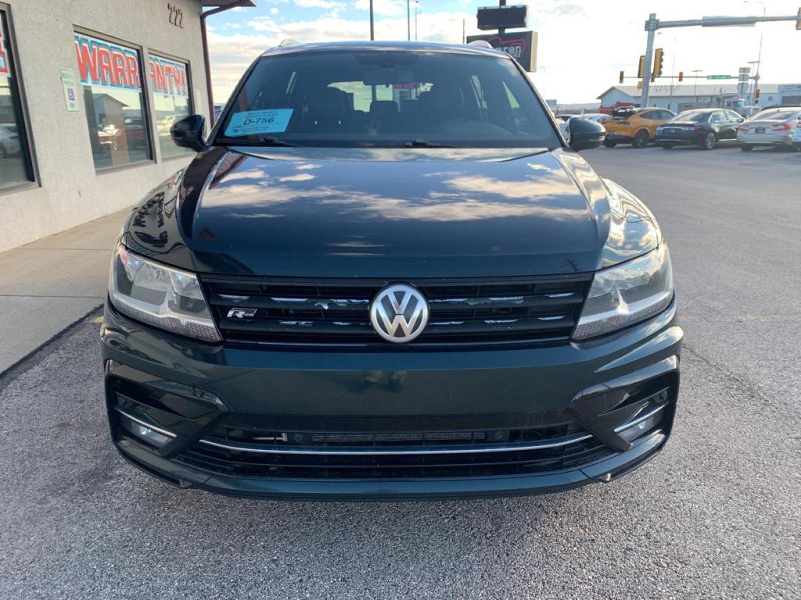 2019 Dark Moss Green Metallic /Titan Black Volkswagen Tiguan SEL R-Line (3VV2B7AX5KM) with an L4, 2.0L engine, 8-speed automatic transmission, located at 222 N Cambell St., Rapid City, SD, 57701, (866) 420-2727, 44.081833, -103.191032 - Photo #2