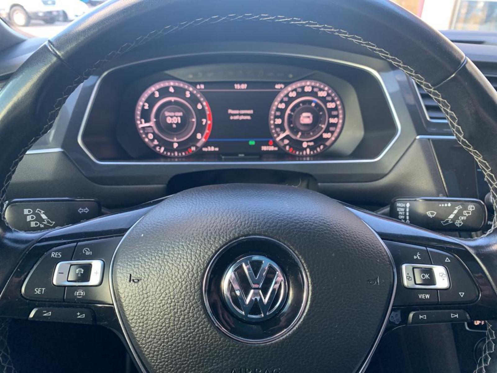 2019 Dark Moss Green Metallic /Titan Black Volkswagen Tiguan SEL R-Line (3VV2B7AX5KM) with an L4, 2.0L engine, 8-speed automatic transmission, located at 222 N Cambell St., Rapid City, SD, 57701, (866) 420-2727, 44.081833, -103.191032 - <b>Equipment</b><br>It features a hands-free Bluetooth phone system. The vehicle has satellite radio capabilities. Protect this model from unwanted accidents with a cutting edge backup camera system. The vehicle has a clean CARFAX vehicle history report. Apple CarPlay: Seamless smartphone integratio - Photo #33