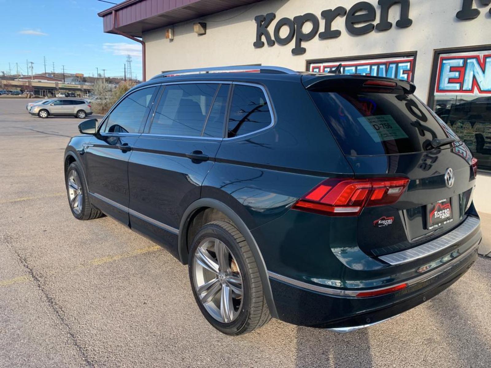2019 Dark Moss Green Metallic /Titan Black Volkswagen Tiguan SEL R-Line (3VV2B7AX5KM) with an L4, 2.0L engine, 8-speed automatic transmission, located at 222 N Cambell St., Rapid City, SD, 57701, (866) 420-2727, 44.081833, -103.191032 - <b>Equipment</b><br>It features a hands-free Bluetooth phone system. The vehicle has satellite radio capabilities. Protect this model from unwanted accidents with a cutting edge backup camera system. The vehicle has a clean CARFAX vehicle history report. Apple CarPlay: Seamless smartphone integratio - Photo #6