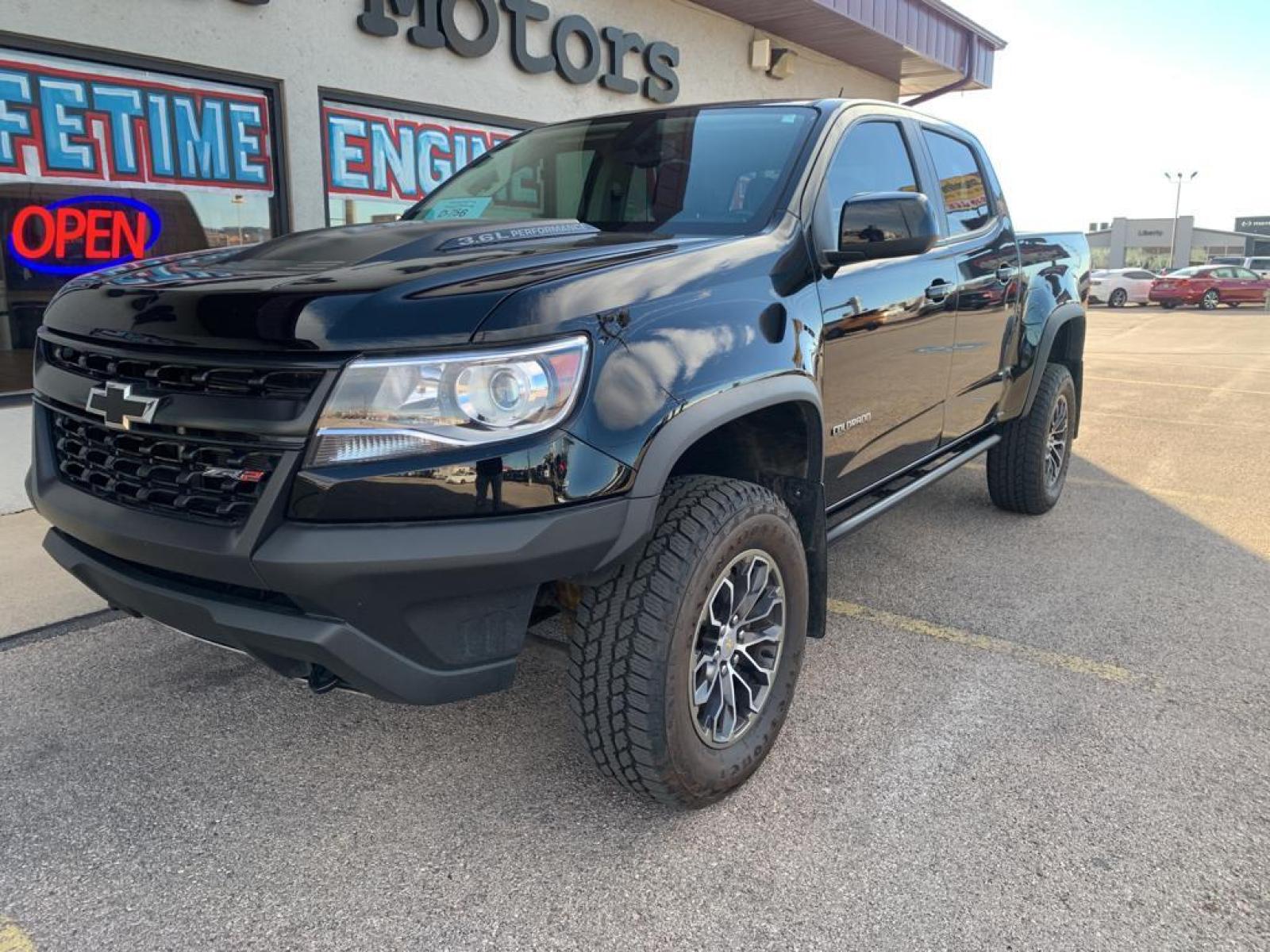 2019 BLACK /Jet Black Chevrolet Colorado 4WD ZR2 (1GCGTEEN8K1) with an V6, 3.6L engine, 8-speed automatic transmission, located at 222 N Cambell St., Rapid City, SD, 57701, (866) 420-2727, 44.081833, -103.191032 - <b>Equipment</b><br>This vehicle has a clean CARFAX vehicle history report. This Chevrolet Colorado features a high end BOSE stereo system. An off-road package is installed on this vehicle so you are ready for your four-wheeling best. This Chevrolet Colorado features a hands-free Bluetooth phone sys - Photo #1