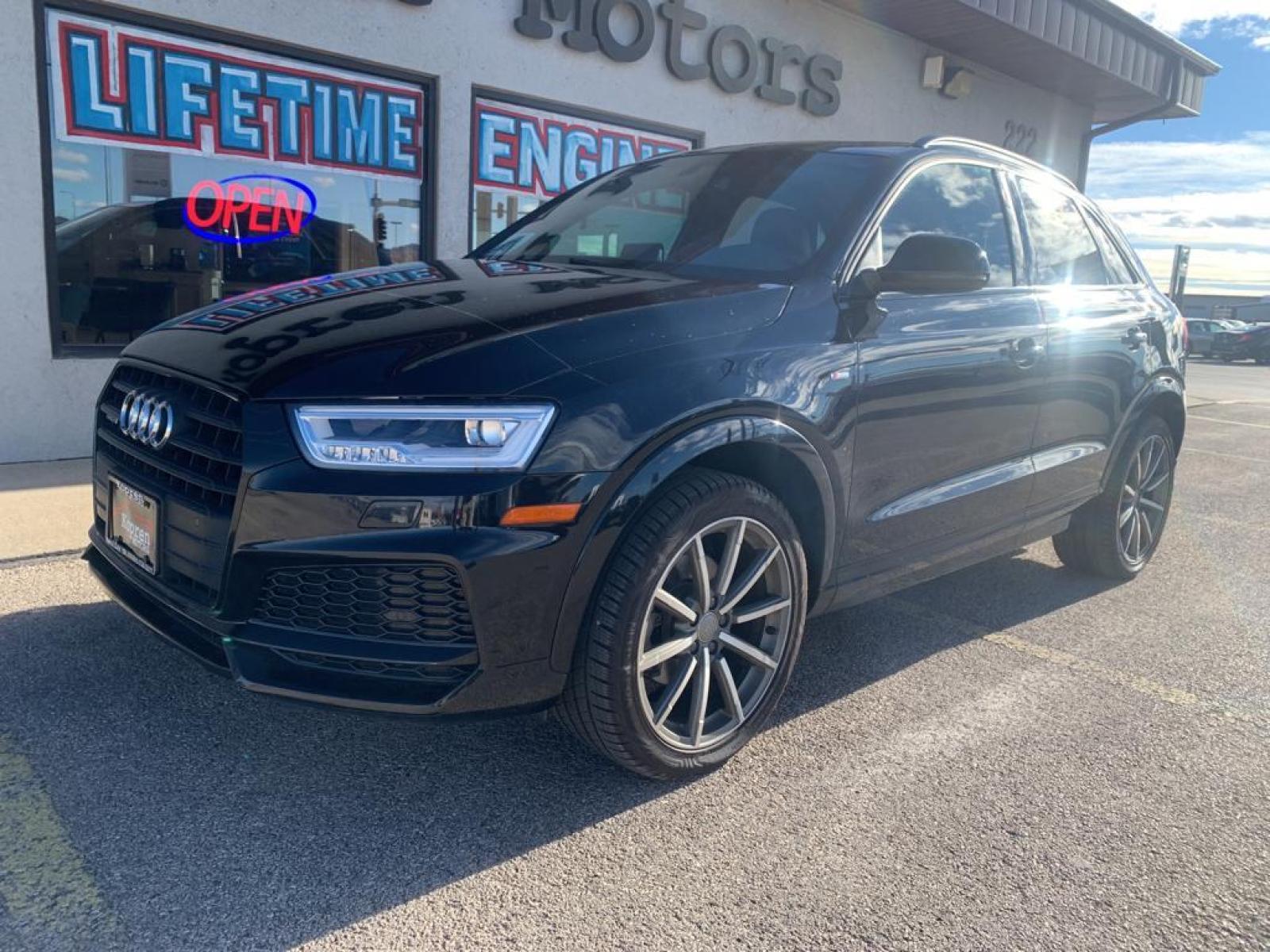 2018 Brilliant Black /Black Audi Q3 Premium Plus (WA1JCCFS1JR) with an L4, 2.0L engine, 6-speed automatic transmission, located at 222 N Cambell St., Rapid City, SD, 57701, (866) 420-2727, 44.081833, -103.191032 - <b>Equipment</b><br>Protect this model from unwanted accidents with a cutting edge backup camera system. The rear parking assist technology on this unit will put you at ease when reversing. The system alerts you as you get closer to an obstruction. This mid-size suv features a hands-free Bluetooth - Photo #1