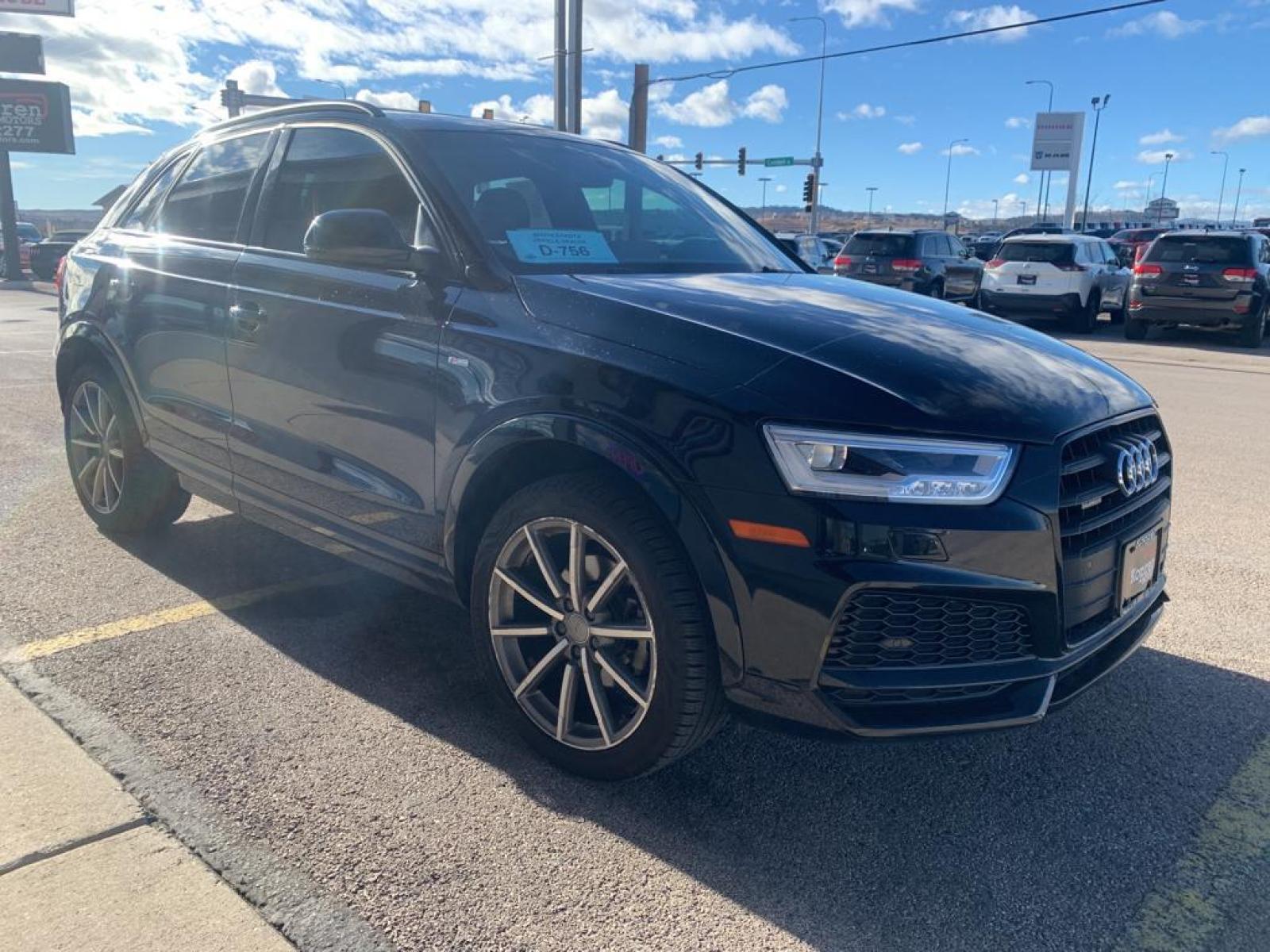 2018 Brilliant Black /Black Audi Q3 Premium Plus (WA1JCCFS1JR) with an L4, 2.0L engine, 6-speed automatic transmission, located at 222 N Cambell St., Rapid City, SD, 57701, (866) 420-2727, 44.081833, -103.191032 - <b>Equipment</b><br>Protect this model from unwanted accidents with a cutting edge backup camera system. The rear parking assist technology on this unit will put you at ease when reversing. The system alerts you as you get closer to an obstruction. This mid-size suv features a hands-free Bluetooth - Photo #3