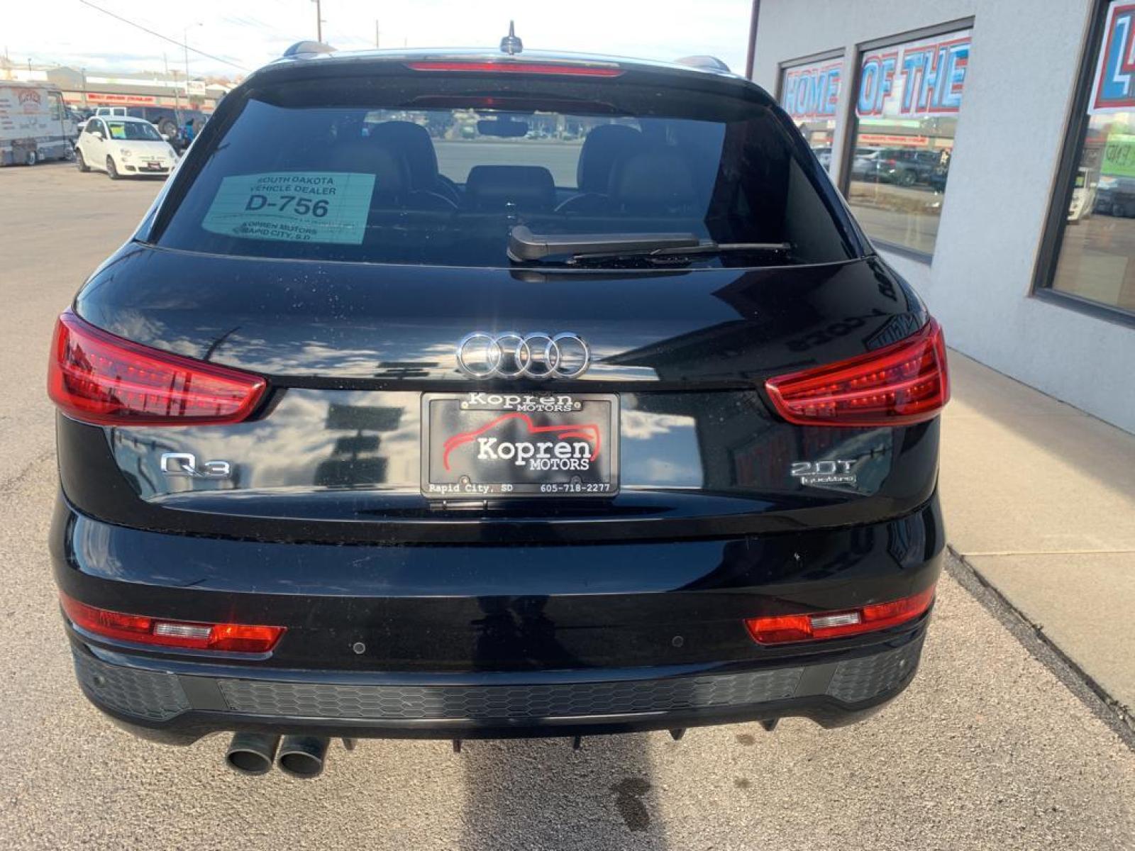 2018 Brilliant Black /Black Audi Q3 Premium Plus (WA1JCCFS1JR) with an L4, 2.0L engine, 6-speed automatic transmission, located at 222 N Cambell St., Rapid City, SD, 57701, (866) 420-2727, 44.081833, -103.191032 - <b>Equipment</b><br>Protect this model from unwanted accidents with a cutting edge backup camera system. The rear parking assist technology on this unit will put you at ease when reversing. The system alerts you as you get closer to an obstruction. This mid-size suv features a hands-free Bluetooth - Photo #5