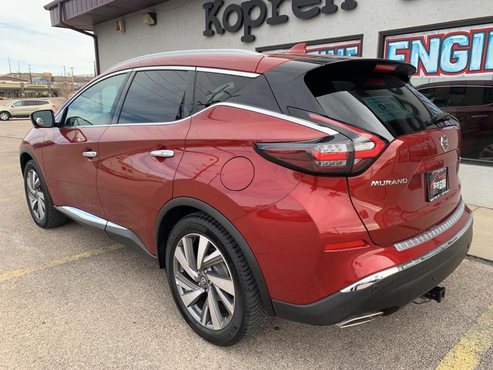 2020 Cayenne Red Metallic Nissan Murano SL (5N1AZ2CS3LN) with an V6, 3.5L engine, CVT transmission, located at 222 N Cambell St., Rapid City, SD, 57701, (866) 420-2727, 44.081833, -103.191032 - The vehicle offers Android Auto for seamless smartphone integration. This mid-size suv features a high end BOSE stereo system. See what's behind you with the back up camera on the Nissan Murano. The state of the art park assist system will guide you easily into any spot. Our dealership has already r - Photo #6